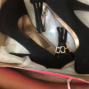 Black heels strap around the ankle